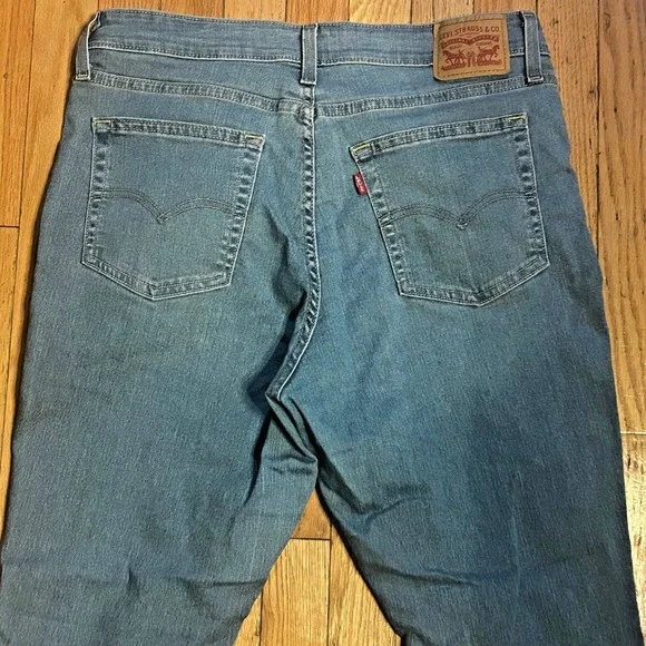 Levi's Women's 725 High Rise Bootcut Denim Jeans Raw Hem Size 32 - Picture 2 of 2